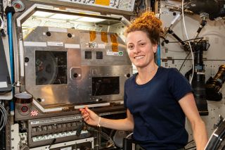 Loral O'Hara on the ISS with Flawless Photonics fibre drawer